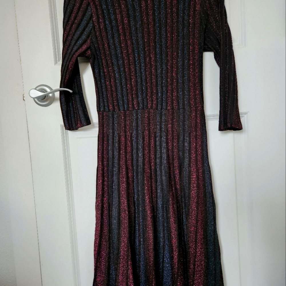 Nanette Lepore knit like dress in metallic colors in size medium.